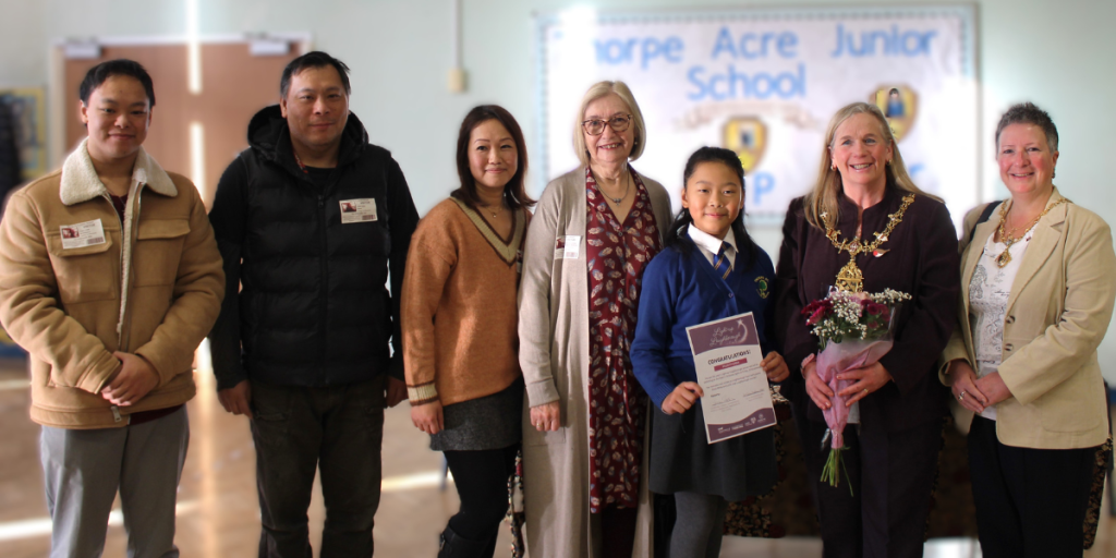 Photo shows (from left) - Cody Chan (Felicity's brother), Leon Chan (Felicity's father), Karolin Chan (Felicity's mother), lead member for economic development, regeneration and town centres Cllr Jennifer Tillotson, Light up Loughborough winner Felicity Chan, Mayor of Charnwood Cllr Dr Julie Bradshaw MBE, and Mayoress Julie Ellerbeck.