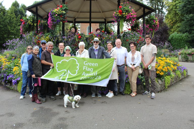 Photo shows those who have helped Queen's Park in Loughborough retain its Green Flag Award for another year